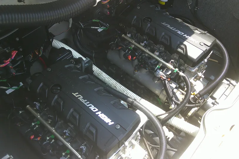 Slide: The Image of Yamaha Boats 2010 242 Limited S engine compartment with dual high-output engines. - 23