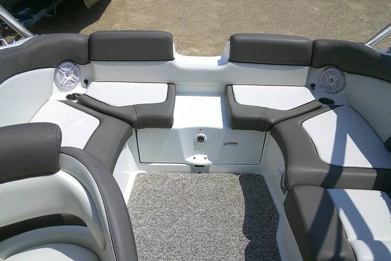 Slide: The Image of 2010 Yamaha Boats 242 Limited S interior with gray and white seating. - 24