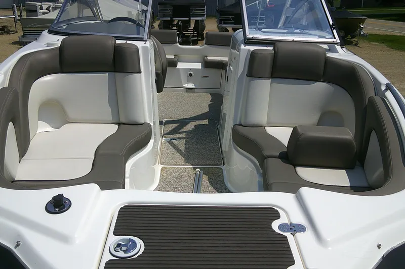 Slide: The Image of 2010 Yamaha Boats 242 Limited S interior with spacious seating and modern design. - 3