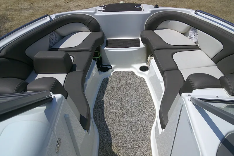 Slide: The Image of Interior of 2010 Yamaha Boats 242 Limited S, featuring spacious seating and modern design. - 4