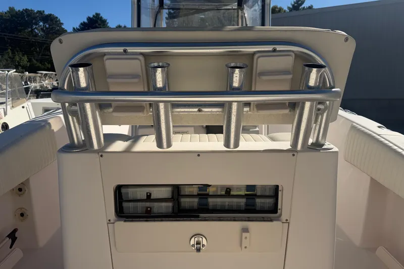 Slide: The Image of 2005 Grady-White Advance 257 boat interior with seating and steering wheel. - 8