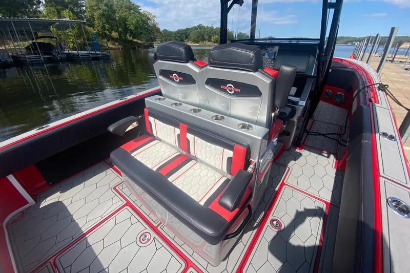 Slide: The Image of 2021 Fountain 34 SC boat interior with stylish seating and modern design. - 14