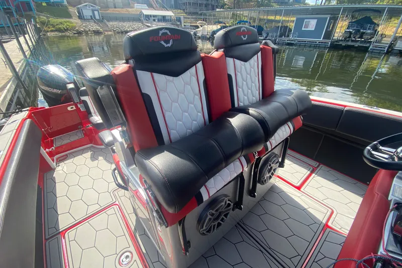 Slide: The Image of 2021 Fountain 34 SC boat interior with stylish seating and modern design. - 18
