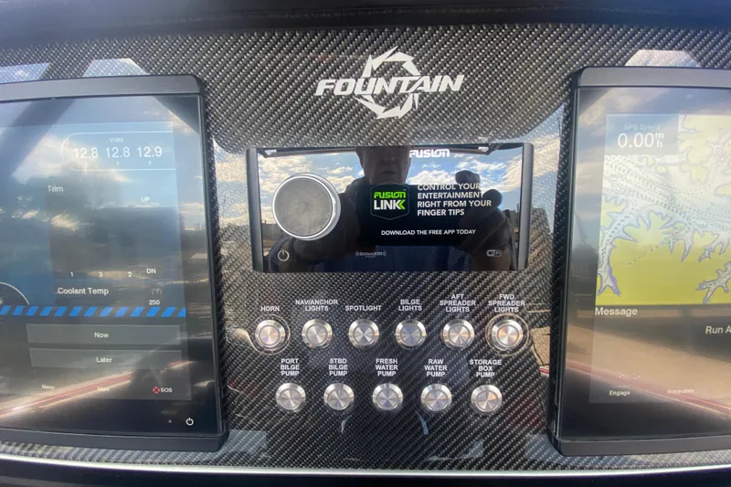 Slide: The Image of Dashboard of 2021 Fountain 34 SC boat with digital controls and navigation displays. - 25