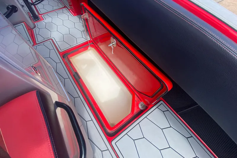 Slide: The Image of 2021 Fountain 34 SC boat interior with red and white hexagonal flooring. - 44