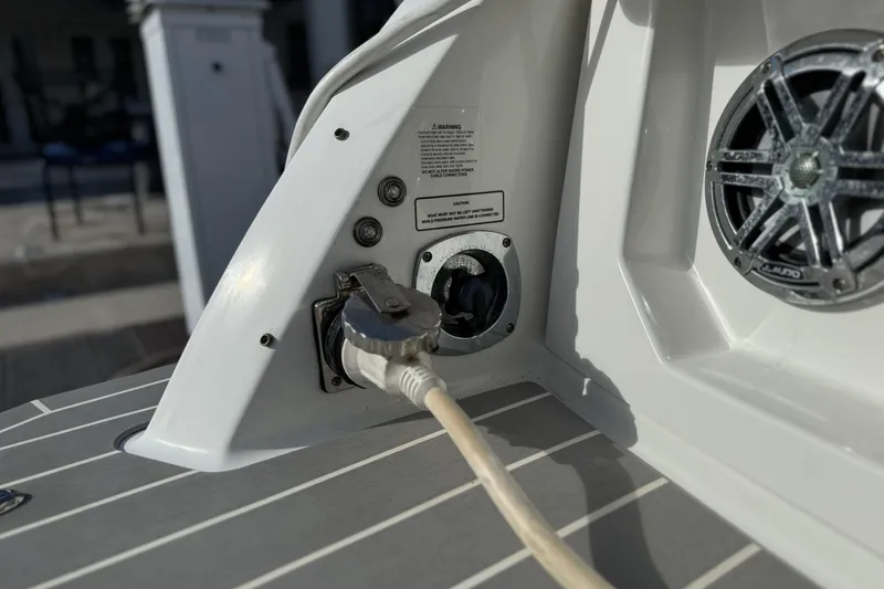 Slide: The Image of 2021 Formula 330 Crossover Bowrider OB power connection and speaker detail. - 16