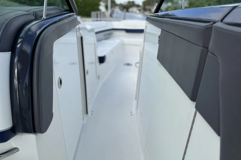 Slide: The Image of 2021 Formula 330 Crossover Bowrider OB interior, featuring sleek seating and modern design. - 38