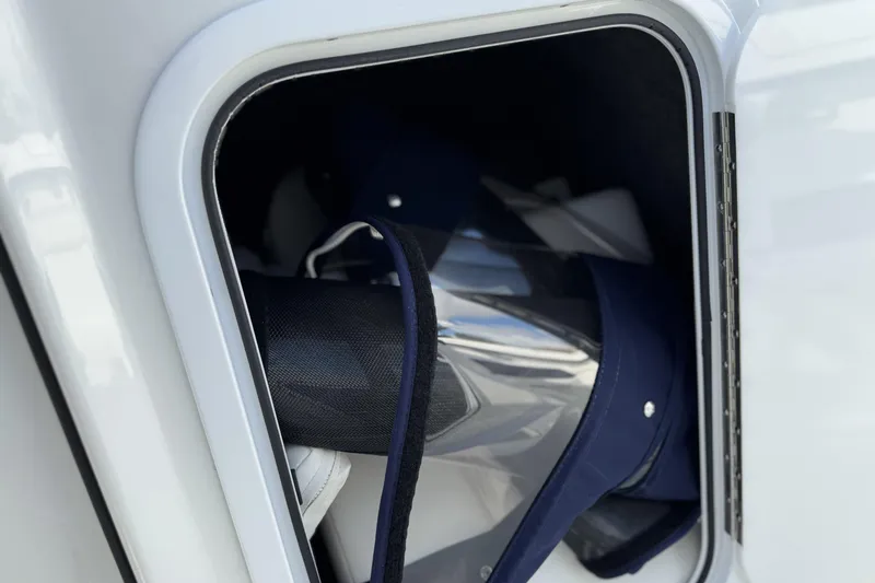 Slide: The Image of Storage compartment of 2021 Formula 330 Crossover Bowrider OB boat. - 40