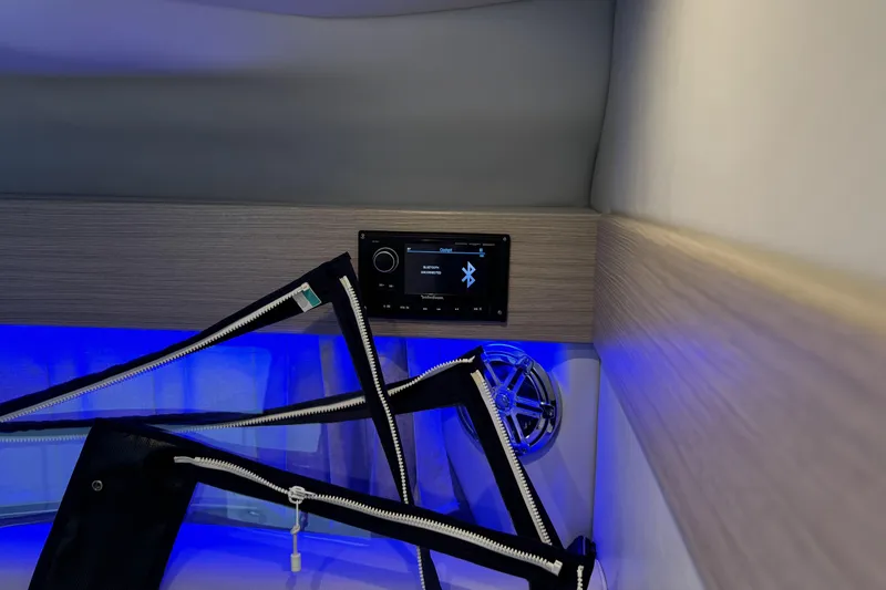 Slide: The Image of 2021 Formula 330 Crossover Bowrider OB interior with Bluetooth stereo and blue LED lighting. - 55