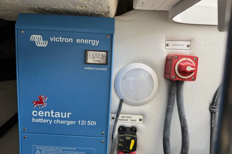 Slide: The Image of Victron Energy Centaur battery charger in 2021 Formula 330 Crossover Bowrider OB. - 68