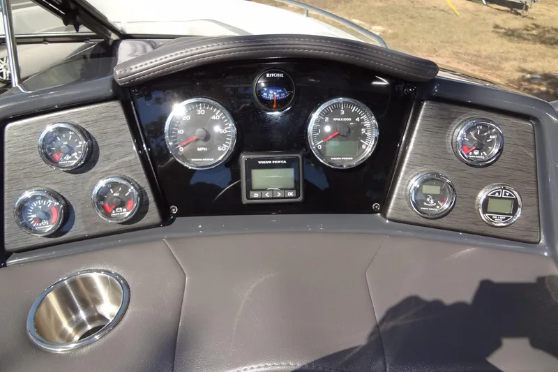 Slide: The Image of 2020 Formula 240 Bowrider interior with white leather seating and cup holders. - 26