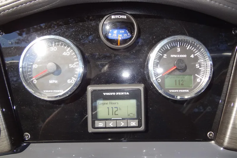 Slide: The Image of 2020 Formula 240 Bowrider interior with white leather seating and cup holders. - 27