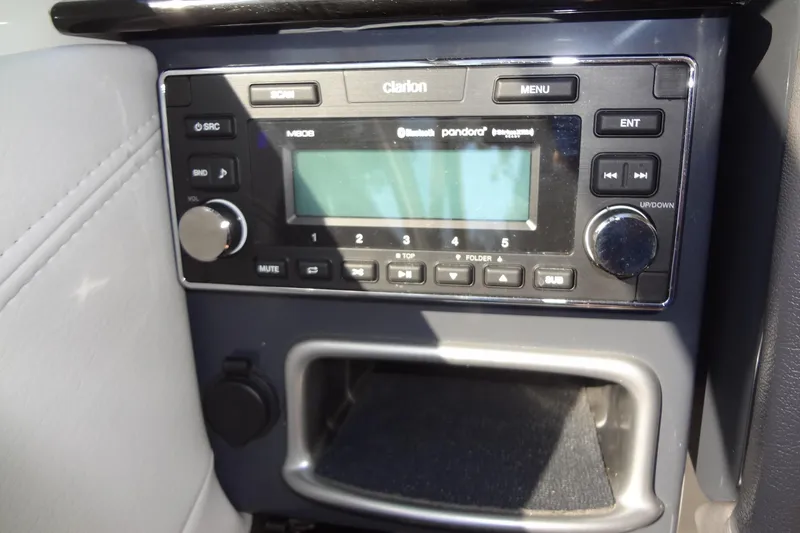 Slide: The Image of 2020 Formula 240 Bowrider interior seating with white upholstery and sleek design. - 31