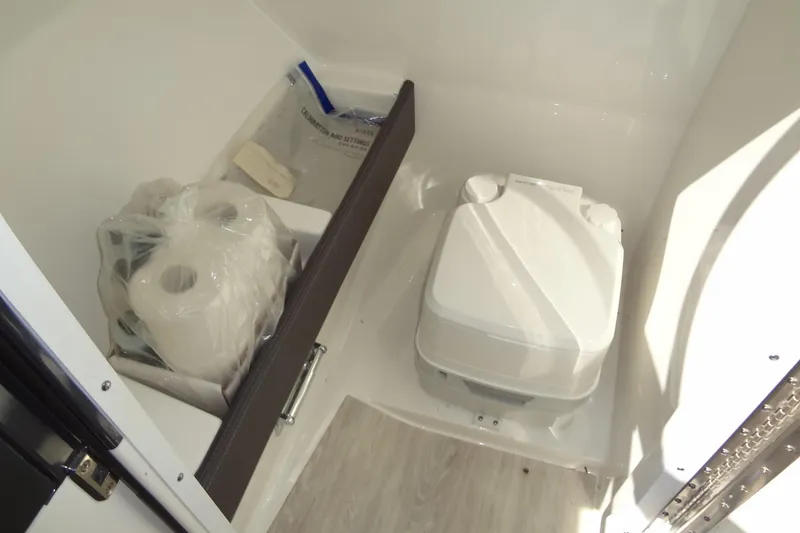 Slide: The Image of Control panel of a 2020 Formula 240 Bowrider boat with switches and display. - 35