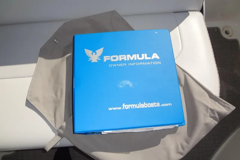 Slide: The Image of Anchor and rope storage in 2020 Formula 240 Bowrider boat compartment. - 45