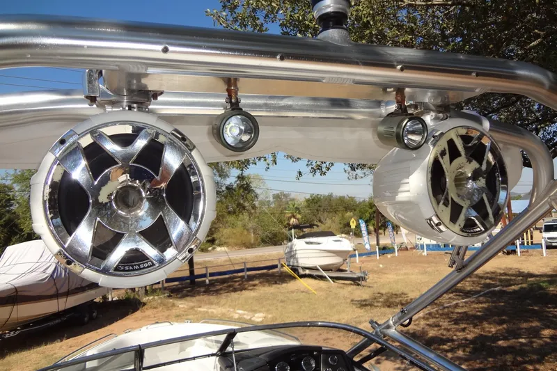 Slide: The Image of Storage compartment of 2020 Formula 240 Bowrider with ropes and fenders. - 49