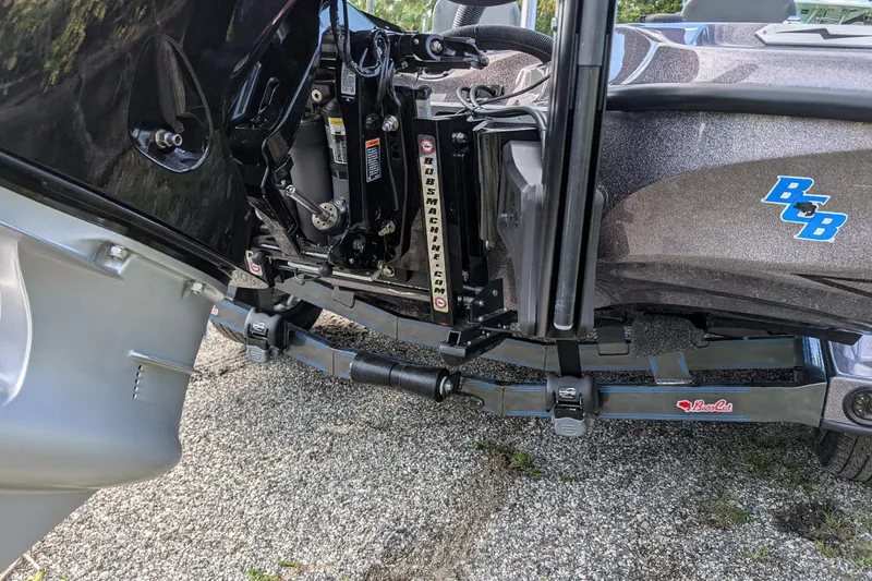 Slide: The Image of 2026 Bass Cat Eyra SP boat engine and hydraulic system close-up. - 11