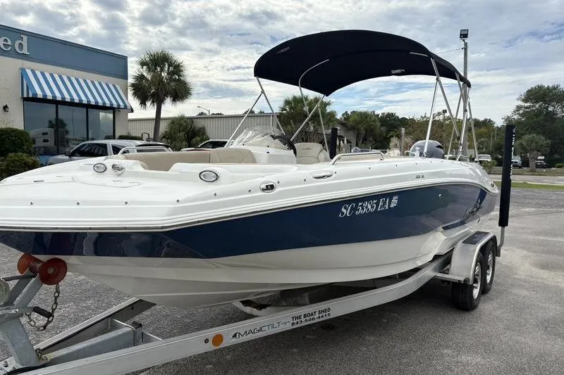 Slide: The Image of 2022 NauticStar 203 SC boat with Yamaha 150 engine on trailer. - 5