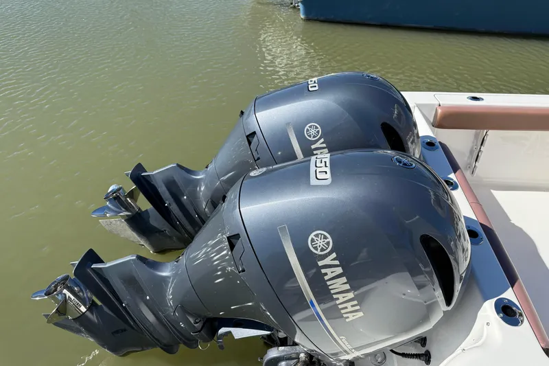 Slide: The Image of Twin Yamaha outboard engines on a 2017 Tidewater 252 CC Adventure boat. - 5
