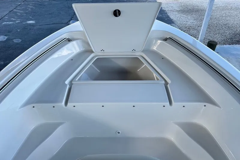Slide: The Image of 2026 Key West 189 FS boat bow with open storage compartment. - 10