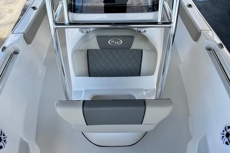 Slide: The Image of 2026 Key West 189 FS boat interior with gray and white seating. - 13