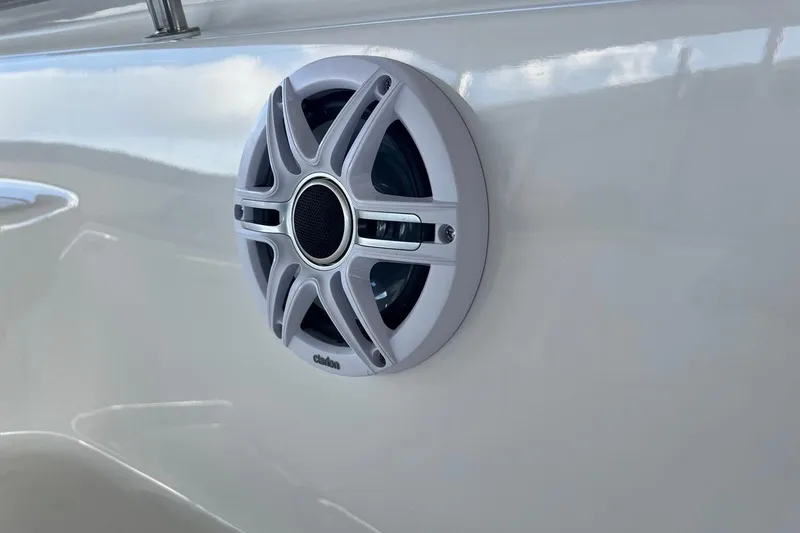 Slide: The Image of Speaker on 2026 Key West 189 FS boat, mounted on white surface. - 29