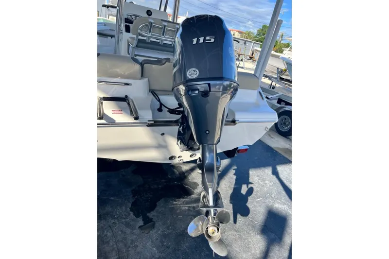 Slide: The Image of 2026 Key West 189 FS boat with 115 horsepower outboard motor, rear view. - 6