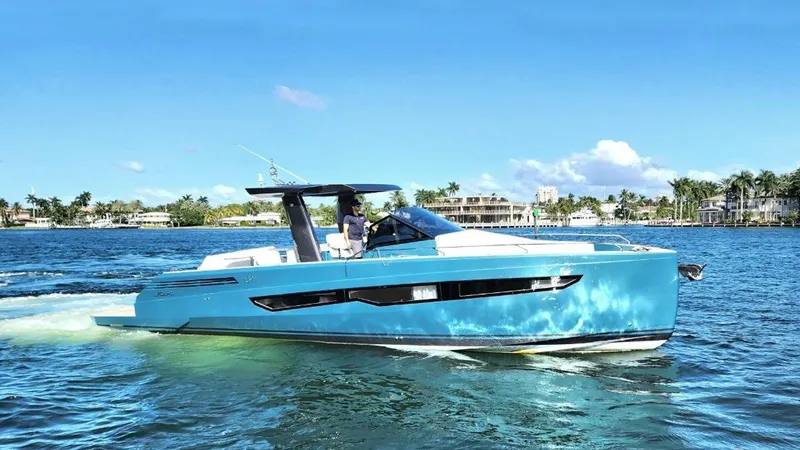 The Image of 2024 Fiart 39 Seawalker yacht cruising on a sunny day, blue water and sky backdrop. - 0