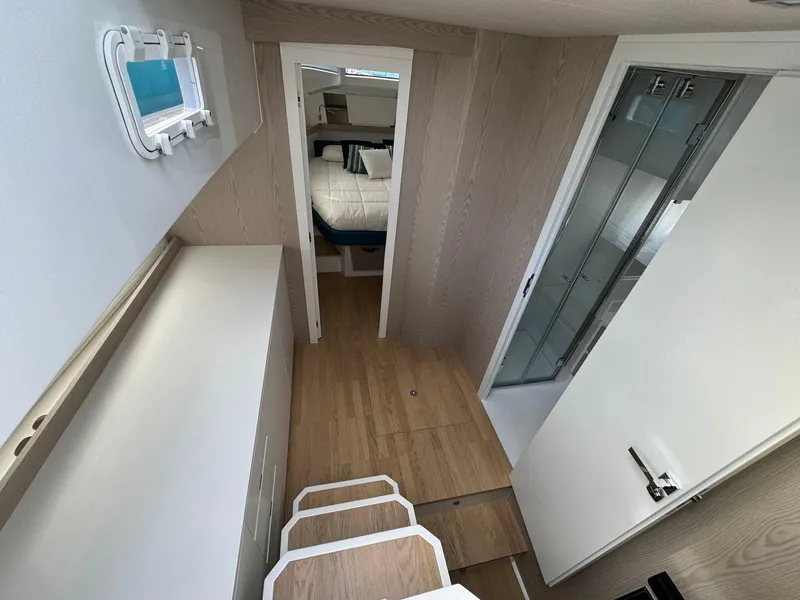 Slide: The Image of Interior of 2024 Fiart 39 Seawalker yacht, featuring modern design and cozy cabin space. - 19