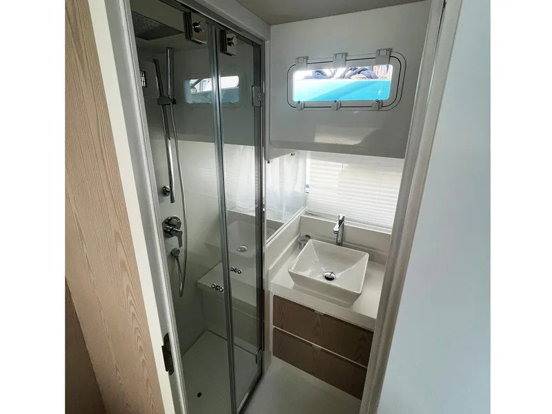 Slide: The Image of 2024 Fiart 39 Seawalker bathroom with modern shower and sink, compact and stylish design. - 23