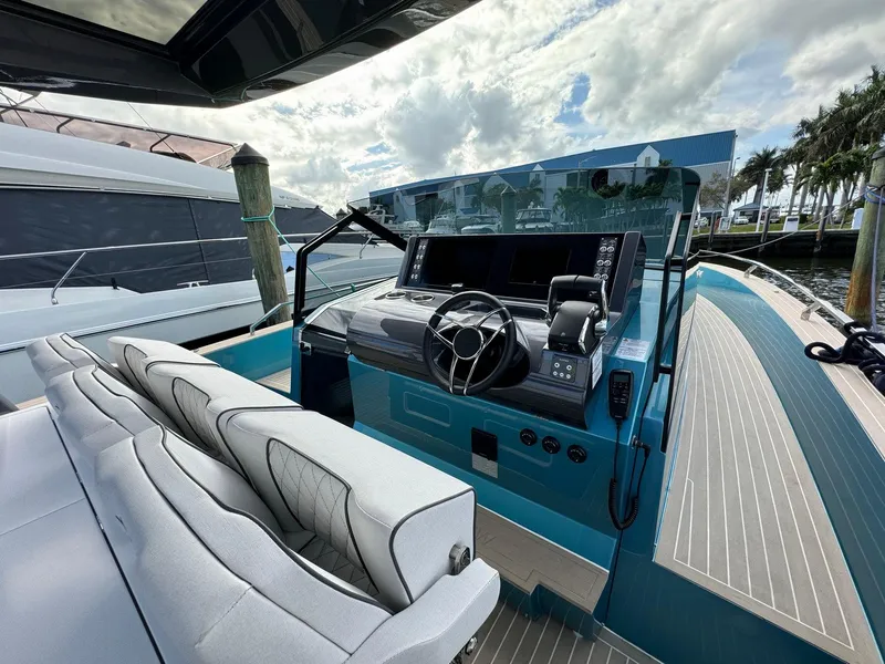 Slide: The Image of 2024 Fiart 39 Seawalker helm with modern controls and luxurious seating. - 7
