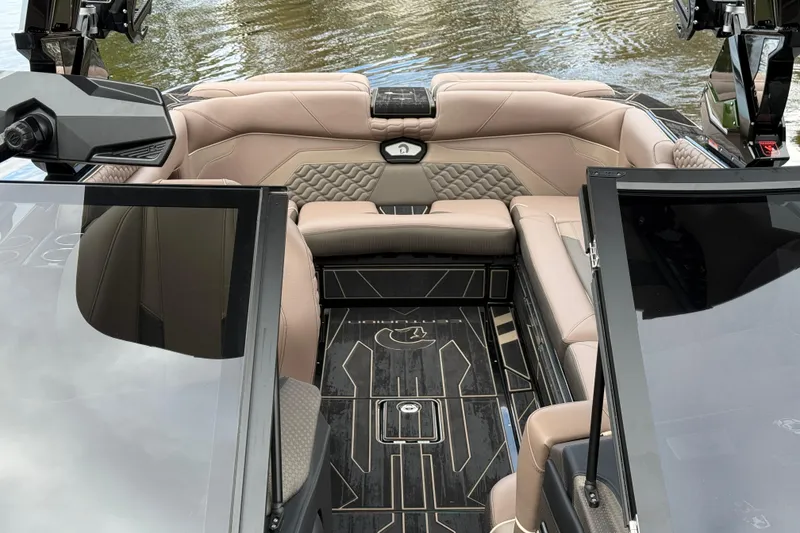 Slide: The Image of Luxurious interior of 2026 Centurion Ri245 boat with elegant seating and modern design. - 14