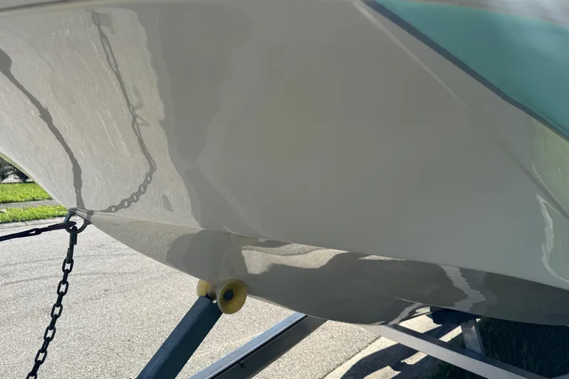 Slide: The Image of 2020 Carolina Skiff 21 LS DC boat hull on trailer, close-up view. - 20
