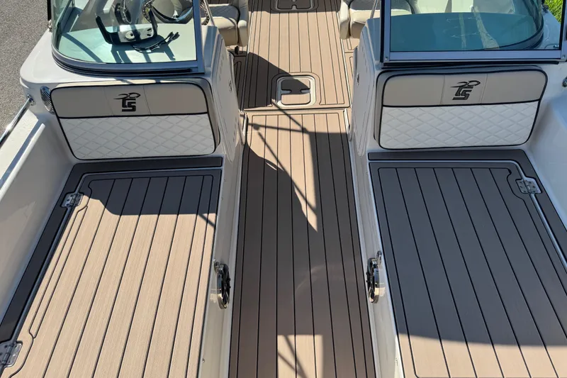 Slide: The Image of 2020 Carolina Skiff 21 LS DC boat interior with sleek deck design and seating. - 34