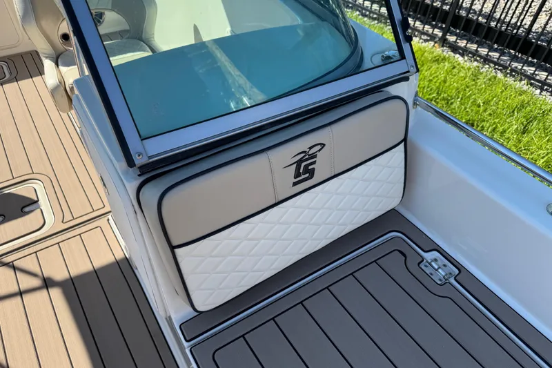 Slide: The Image of 2020 Carolina Skiff 21 LS DC boat interior with cushioned seating and sleek design. - 35