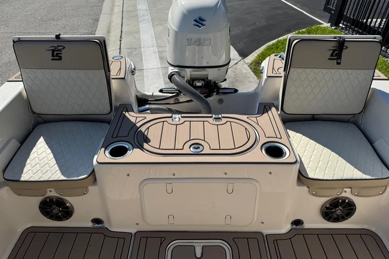 Slide: The Image of 2020 Carolina Skiff 21 LS DC boat interior with seating and Suzuki 140 outboard motor. - 43