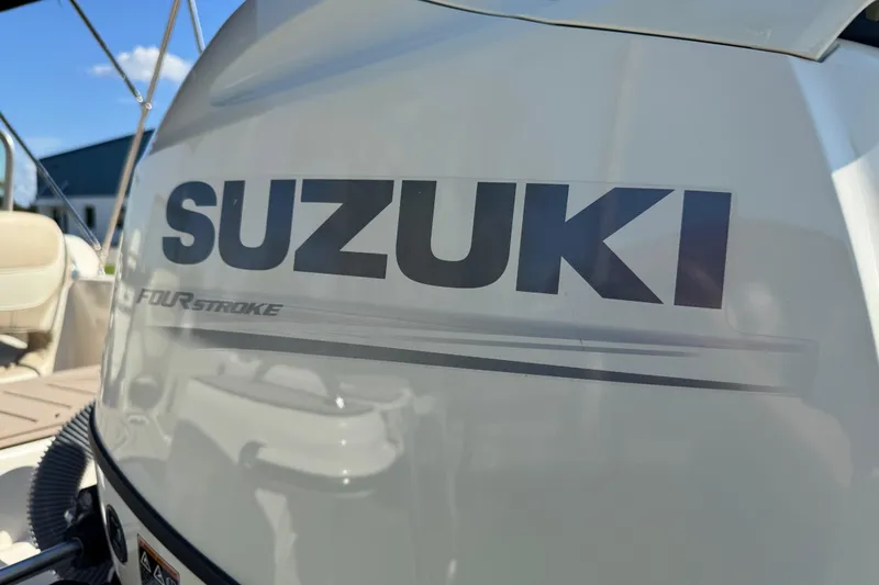 Slide: The Image of 2020 Carolina Skiff 21 LS DC with Suzuki four-stroke engine, close-up view. - 8