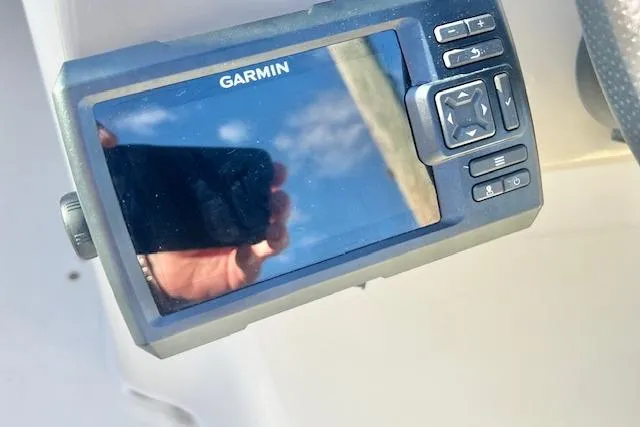 Slide: The Image of Garmin GPS device on 2007 Sea Ray 240 Sundeck boat dashboard. - 4