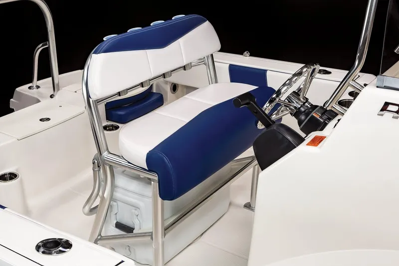Slide: The Image of 2023 Robalo R180 Center Console dashboard with Garmin display and steering wheel. - 11