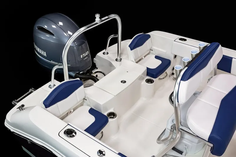 Slide: The Image of 2023 Robalo R180 Center Console dashboard with steering wheel and navigation controls. - 12