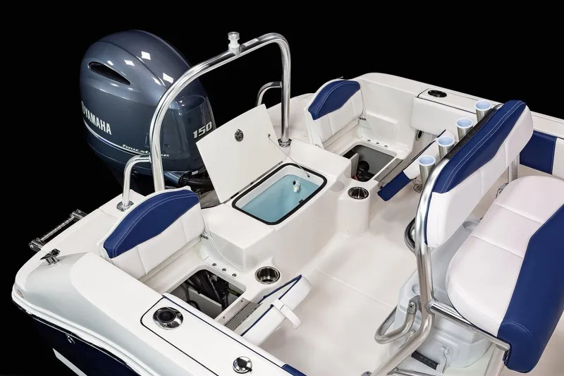 Slide: The Image of 2023 Robalo R180 Center Console capacity label, Yamaha controls, safety warnings. - 13