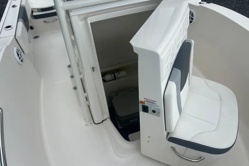 Slide: The Image of 2023 Robalo R180 Center Console boat interior with Garmin system and seating. - 33