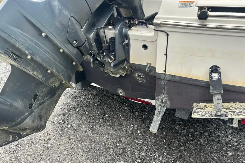 Slide: The Image of 2023 Robalo R180 Center Console boat interior with seating and storage compartments. - 42