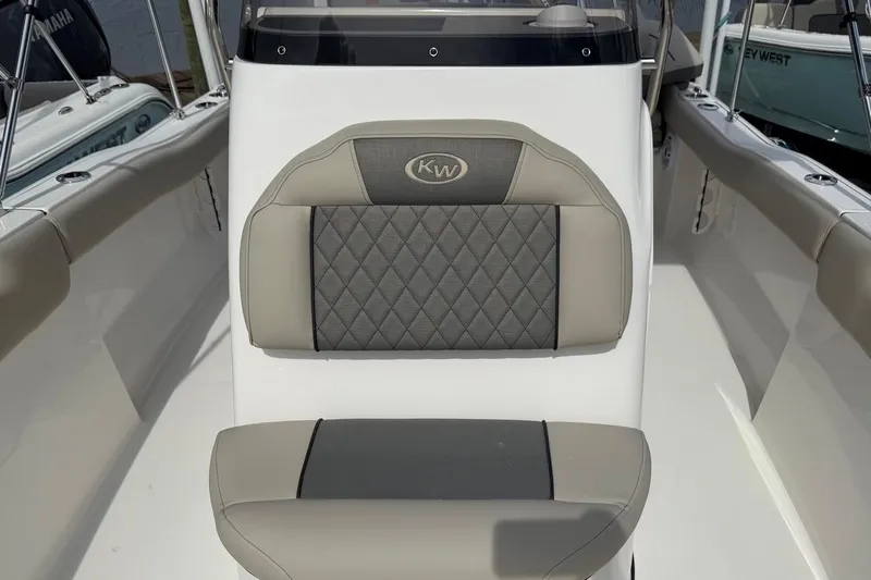 Slide: The Image of 2026 Key West 203 FS boat seat with diamond-patterned upholstery. - 17