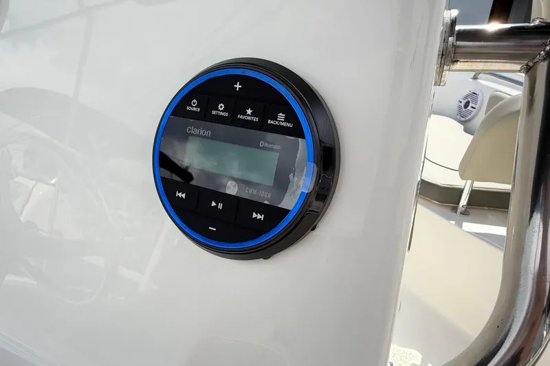Slide: The Image of 2026 Key West 203 FS boat with Clarion audio system control panel. - 22