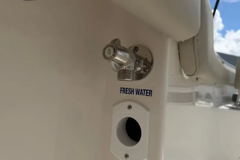 Slide: The Image of Fresh water outlet on 2026 Key West 203 FS boat, featuring a chrome faucet. - 27