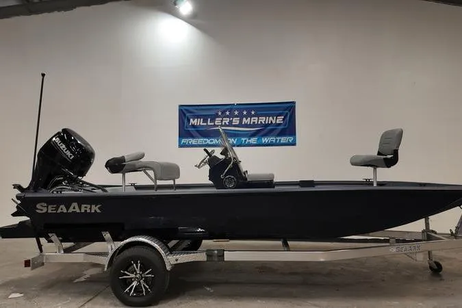 The Image of 2024 SeaArk Shadow 18 t boat on trailer at Miller's Marine showroom. - 0