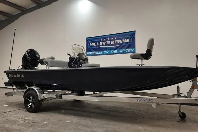 Slide: The Image of 2024 SeaArk Shadow 18 t boat on trailer at Miller's Marine showroom. - 1