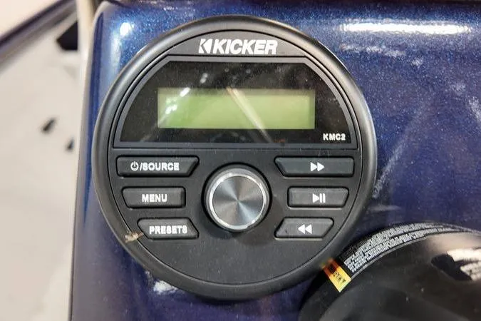 Slide: The Image of Kicker audio system in 2024 SeaArk Shadow 18 t boat dashboard. - 10