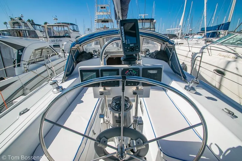 Slide: The Image of Cockpit view of a 1997 Catalina 320 MkII sailboat in a marina. - 28